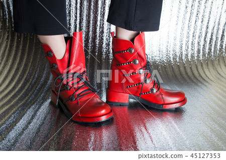 Red women's autumn boots close-up Red women's autumn boots close-up 45127353