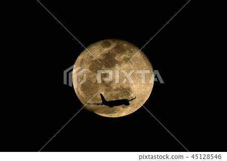 Moon and airliner 45128546