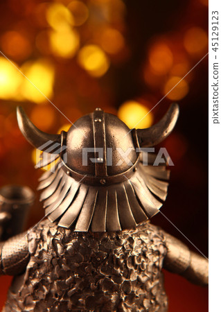 metal Viking figure gold bokeh 45129123