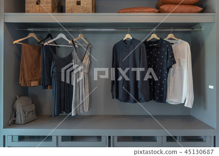 modern closet with clothes 45130687