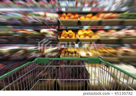 Supermarket aisle with empty shopping cart Supermarket aisle with empty shopping cart 45130782