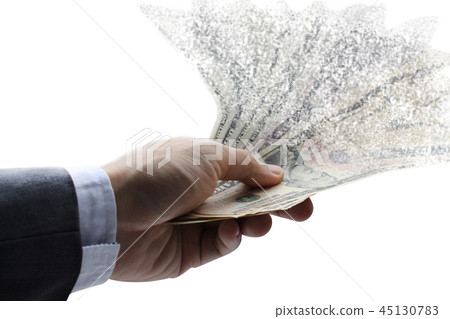 The spread of dollar paper currency in the hand 45130783