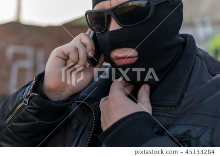 a bandit talking on the phone a bandit talking on the phone 45133284