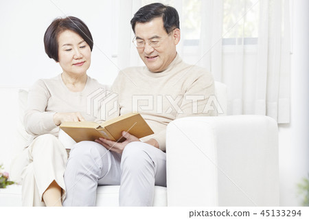 Reading, living room, couple 45133294