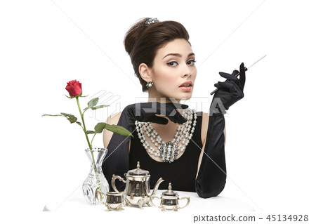 beautiful young woman in retro style with cigarette beautiful young woman in retro style with cigarette 45134928