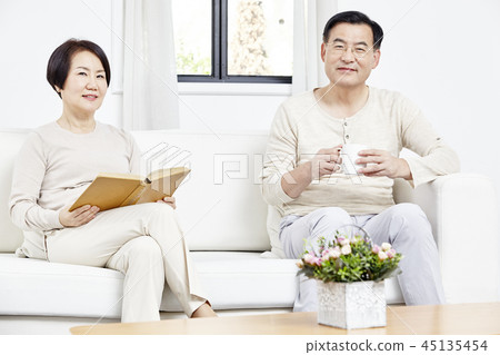 Reading, coffee, living room, couple 45135454