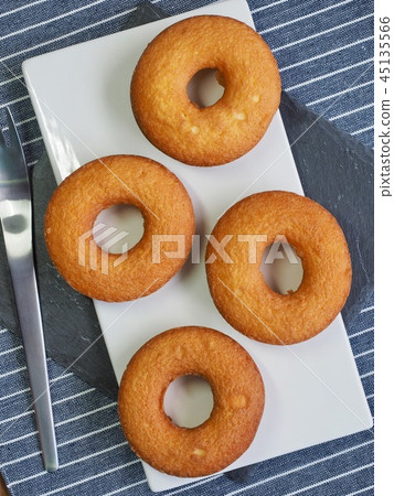 Round donuts and forks 45135566