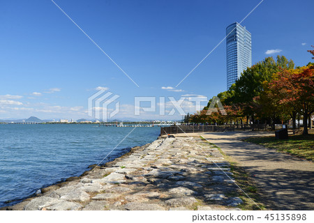 Lake Biwa Nagisa Park and Otsu Prince Hotel (1) under the clear blue sky Lake Biwa Nagisa Park and Otsu Prince Hotel (1) under the clear blue sky 45135898