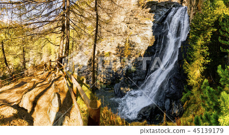Stunning waterfall into the woods Stunning waterfall into the woods 45139179