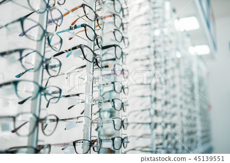 Eyeglasses and sunglasses showcase in optic shop Eyeglasses and sunglasses showcase in optic shop 45139551