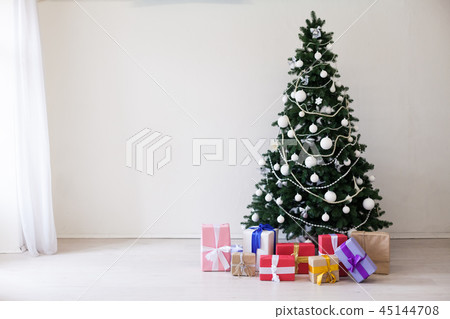 Christmas tree with presents in winter for the new year 45144708