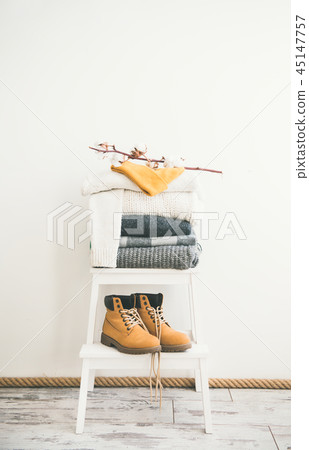 Warm clothing, blankets, boots and cap for cold weather Warm clothing, blankets, boots and cap for cold weather 45147757