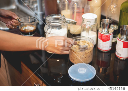 Barista preparing coffee for make iced coffee Barista preparing coffee for make iced coffee 45149136