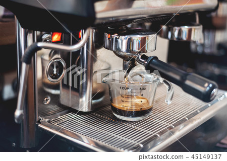 Barista preparing to make coffee in coffee shop Barista preparing to make coffee in coffee shop 45149137