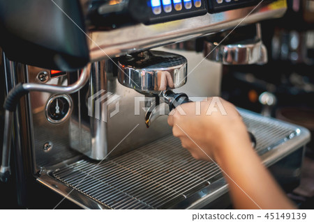 Barista preparing to make coffee in coffee shop 45149139