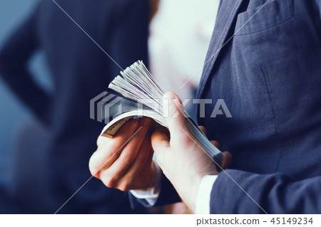 Business people counting money 45149234