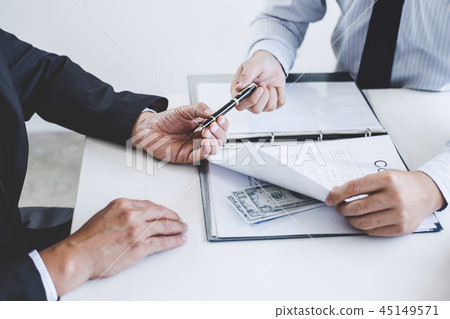 Bribery and corruption concept, bribe in the form of dollar bill 45149571