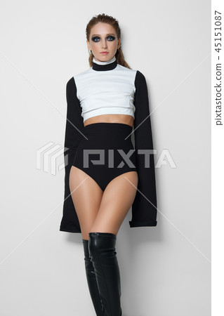Woman in high waisted briefs, short blouse Woman in high waisted briefs, short blouse 45151087