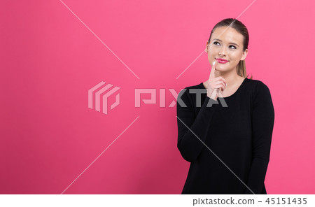 Young woman in a thoughtful pose 45151435