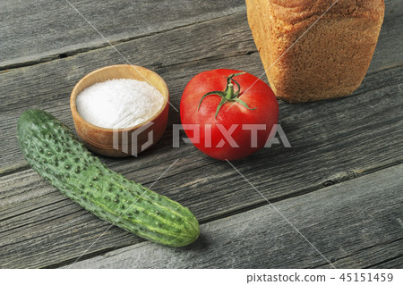 Bread, salt, cucumber and tomato 45151459