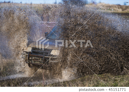 Off road car  overcomes the track 45151771