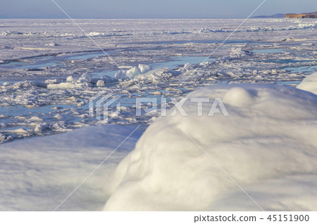 Cracks on the surface of ice. Frozen Lake Baikal 45151900