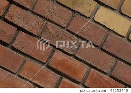 brown brick wall sloping row stone part 45153449