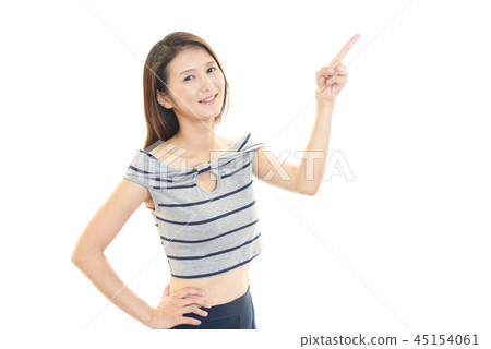 A smiling woman to point A smiling woman to point 45154061