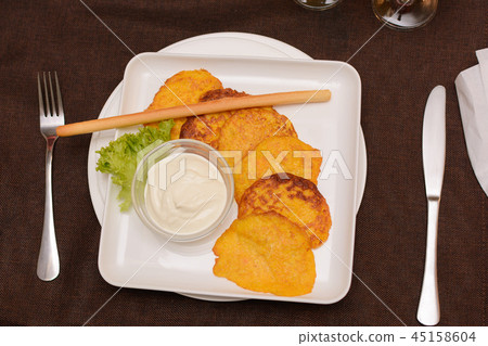 Draniki potato fritters. Naitonal dish of Ukraine Draniki potato fritters. Naitonal dish of Ukraine 45158604