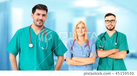 Doctor working in hospital with other doctors. 45159530