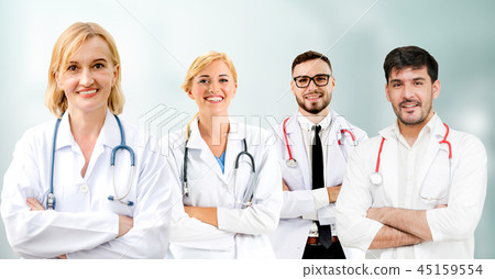 Doctor working in hospital with other doctors. Doctor working in hospital with other doctors. 45159554