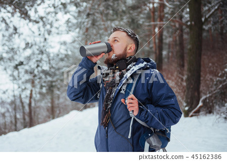 Man Traveler with backpack hiking Travel Lifestyle adventure concept active vacations outdoor Man Traveler with backpack hiking Travel Lifestyle adventure concept active vacations outdoor 45162386