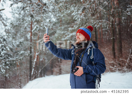 Man Traveler with backpack hiking Travel Lifestyle adventure concept active vacations outdoor 45162395