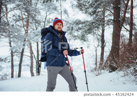 Man Traveler with backpack hiking Travel Lifestyle adventure concept active vacations outdoor Man Traveler with backpack hiking Travel Lifestyle adventure concept active vacations outdoor 45162424
