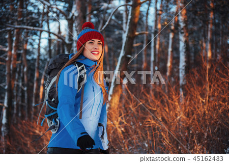 Woman Traveler with backpack hiking Travel Lifestyle adventure concept active vacations outdoor Woman Traveler with backpack hiking Travel Lifestyle adventure concept active vacations outdoor 45162483