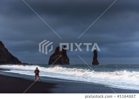 Famous Reynisdrangar rock formations at black Reynisfjara Beach Famous Reynisdrangar rock formations at black Reynisfjara Beach 45164887