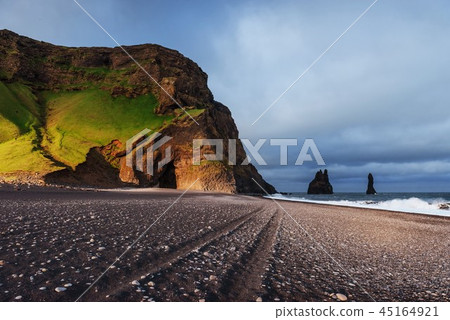 Famous Reynisdrangar rock formations at black Reynisfjara Beach 45164921