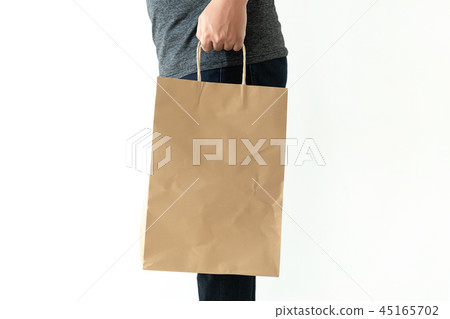 Consumer pack product Man shows bag mock up show Consumer pack product Man shows bag mock up show 45165702