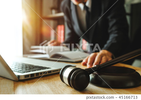 Male lawyer in the office with brass scale Male lawyer in the office with brass scale 45166713