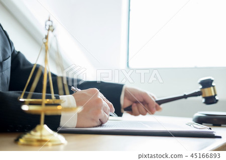 justice and law concept.Male judge lawyer in a courtroom giving 45166893