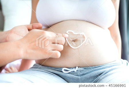 Asian pregnant woman with big belly. Asian pregnant woman with big belly. 45166991