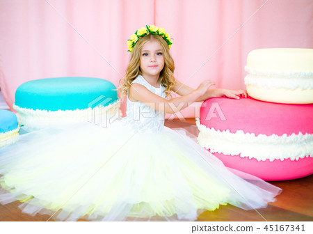 Cute little girl  with giant sweets 45167341
