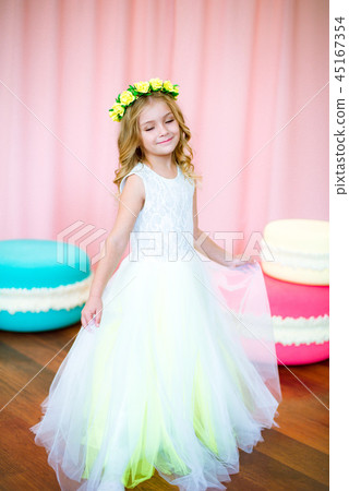 Cute little girl with giant sweets Cute little girl with giant sweets 45167354