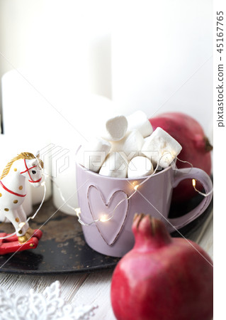cup with marshmallows and Christmas candy. Marshma cup with marshmallows and Christmas candy. Marshma 45167765