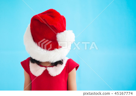 asian girl wearing santa hat and closed her face asian girl wearing santa hat and closed her face 45167774