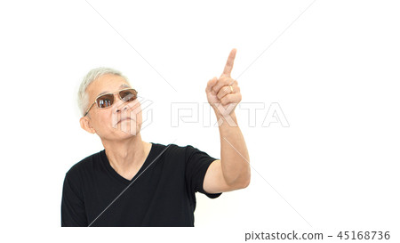 Asian senior man pointing on isolate background Asian senior man pointing on isolate background 45168736