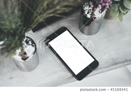 top view blank white screen mobile on table top view blank white screen mobile on table 45169341