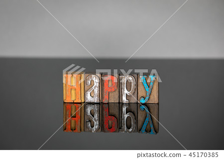 Happy word from colored wooden letters  45170385