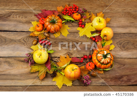 Thanksgiving door wreath apples berries and leaves 45170386