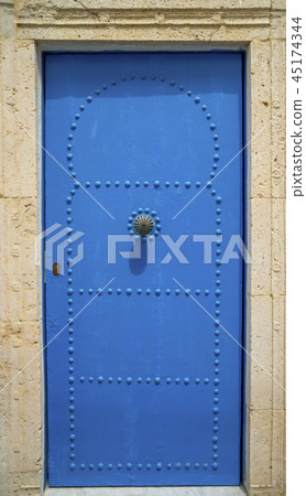 Aged Blue door in Andalusian style Sidi Bou Said Aged Blue door in Andalusian style Sidi Bou Said 45174344